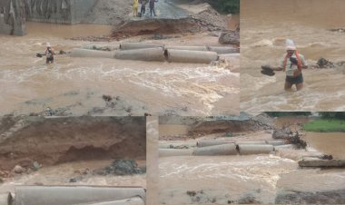 रहदारीसाठी तयार केलेला पर्यायी रस्ता पहिल्याच पुरात गेला वाहून, पुलाचे काम'ही ठप्प...